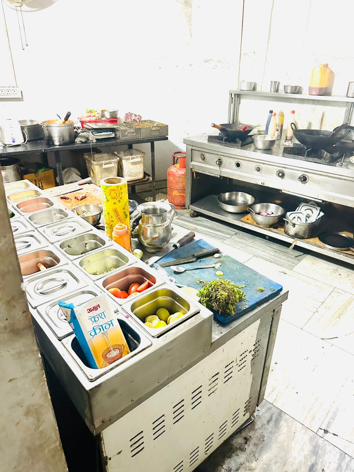The Royale kitchen with fresh cut vegetables and cooking range